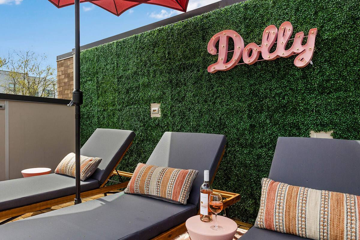 Perfect Rooftop Escape with Sun Loungers and Shaded Areas