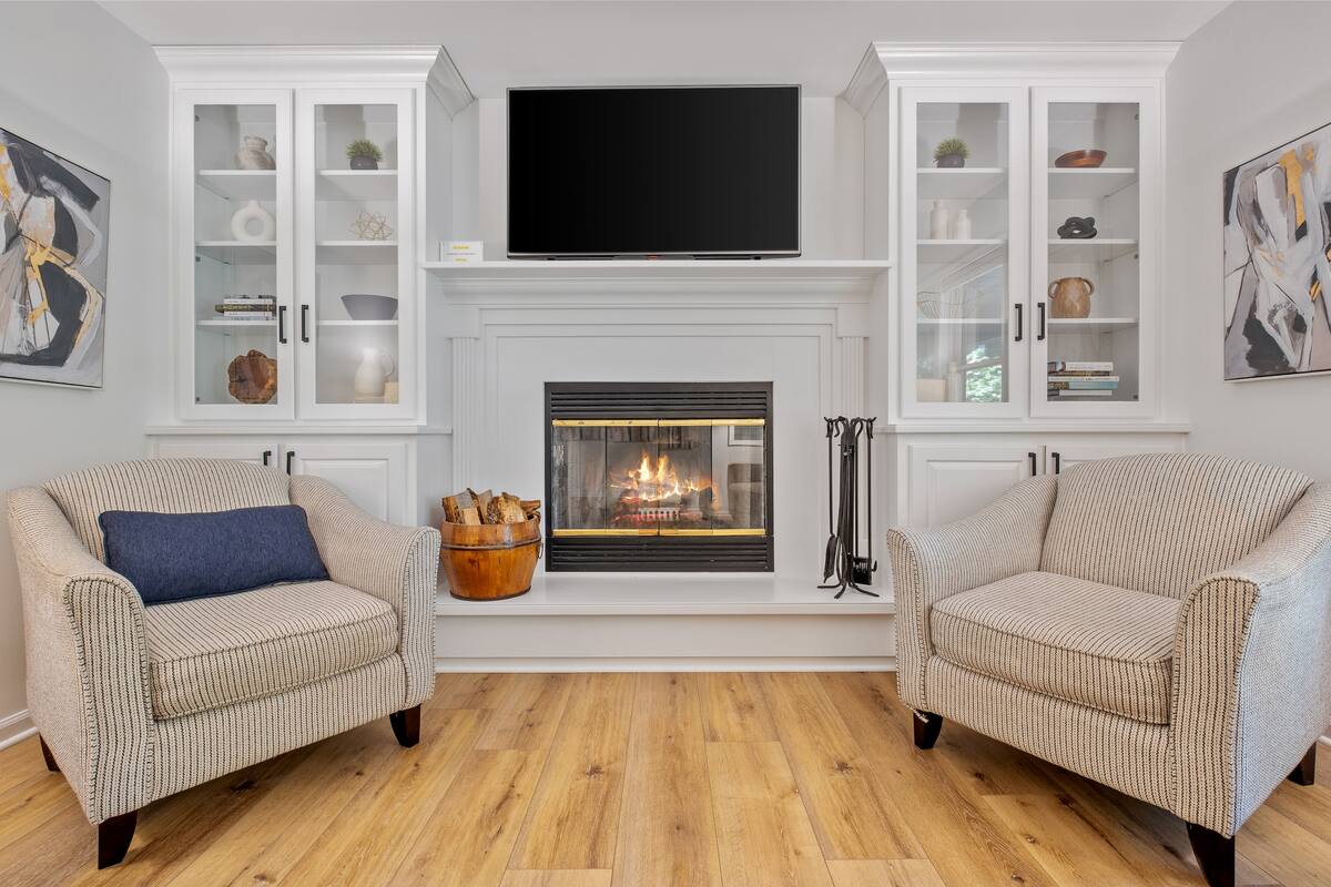 [Main Floor] Cozy up to the fireplace with a good book. 