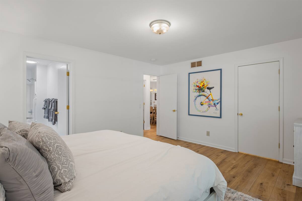 [Main Floor] Bedroom 1 - All mattresses and linens are of the highest quality.