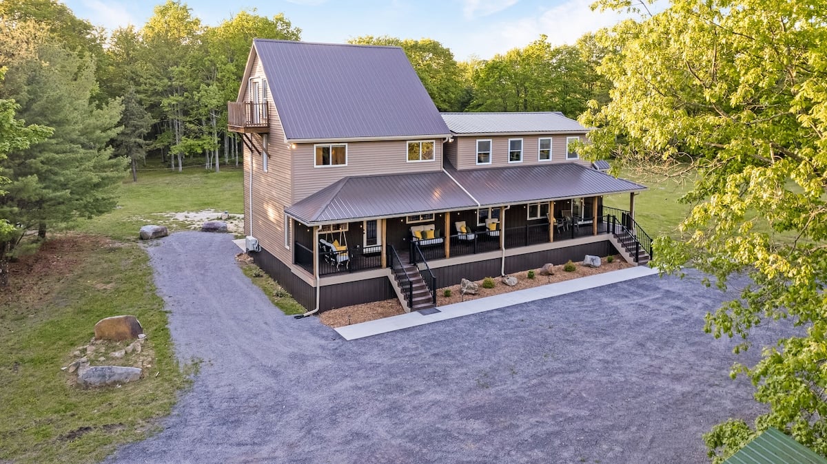 The spacious driveway connects to the front door, making unloading your car quick and easy :)