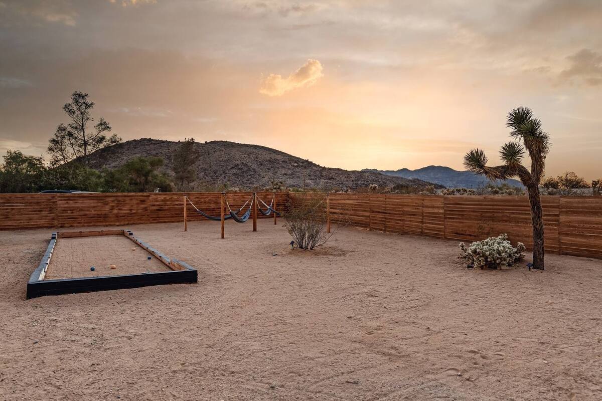 Where the sky stretches wide and the hot tub glows under a million stars in Joshua Tree, CA