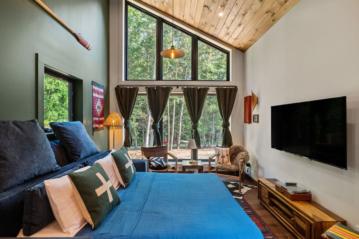 The living room sofa doubles as a queen-sized bed.