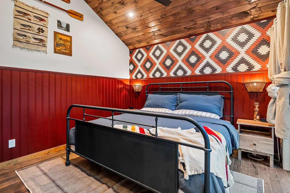 Large, bright primary bedroom with a king-sized bed for a restful night's sleep.