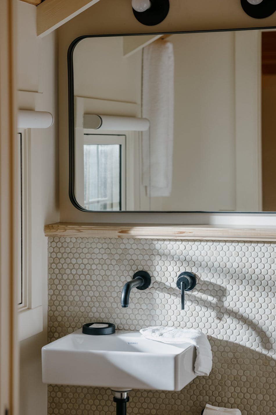 Custom hardwood furniture & Le Labo bath amenities image 17
