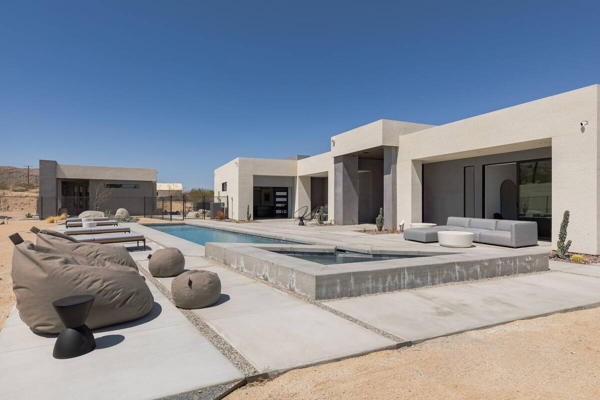 Private pool (pool heating available with fee) & hot tub, with ample lounging, seating, dining, and fire pit