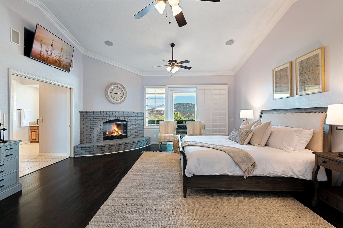 Master Bedroom: 1 King bed, fire place, Smart TV, en suite bath w/dual vanity, walk-in closet