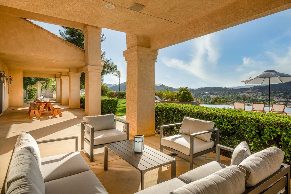 Outdoor patio furnished with plush sofa set