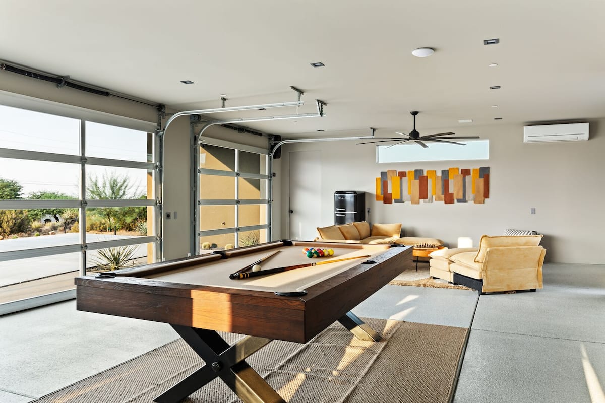 Game room with billiards table.