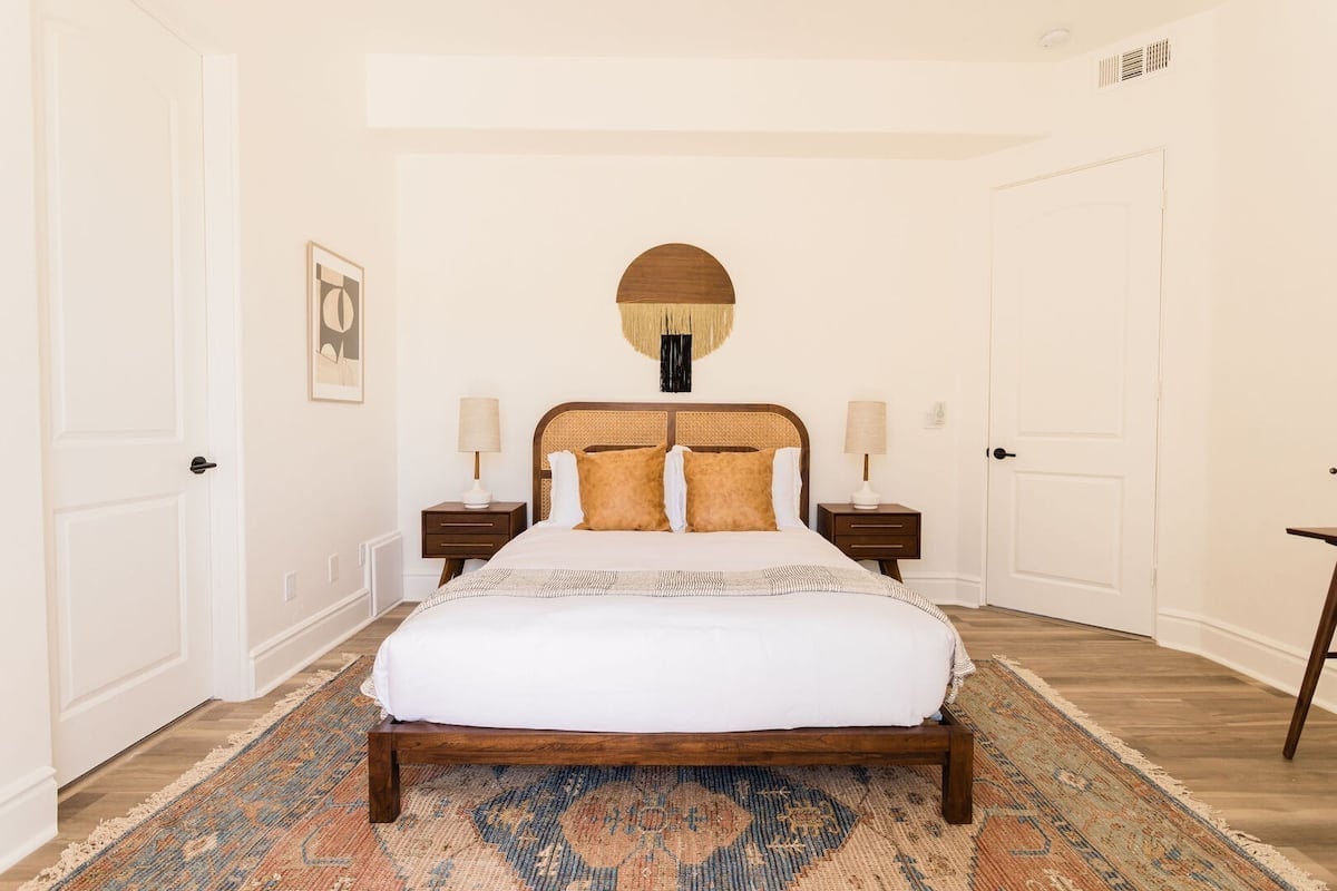 Bedroom 2 features a queen bed.