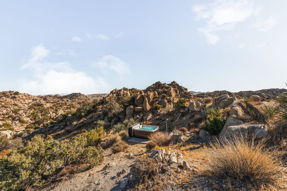 Hot tub amongst the rocks.