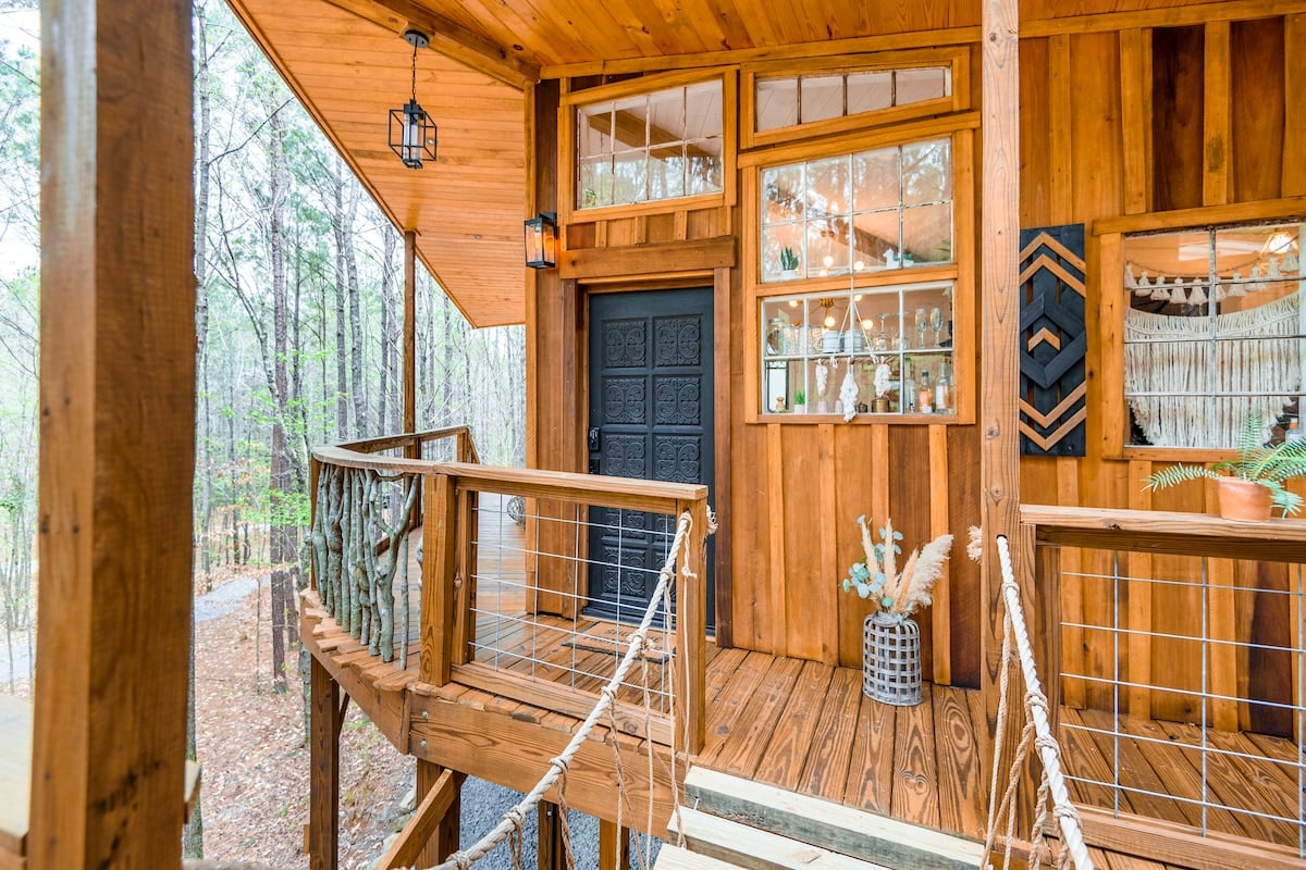 Awaken to the Sounds of Nature in a Luxurious Treehouse in Crane Hill, AL