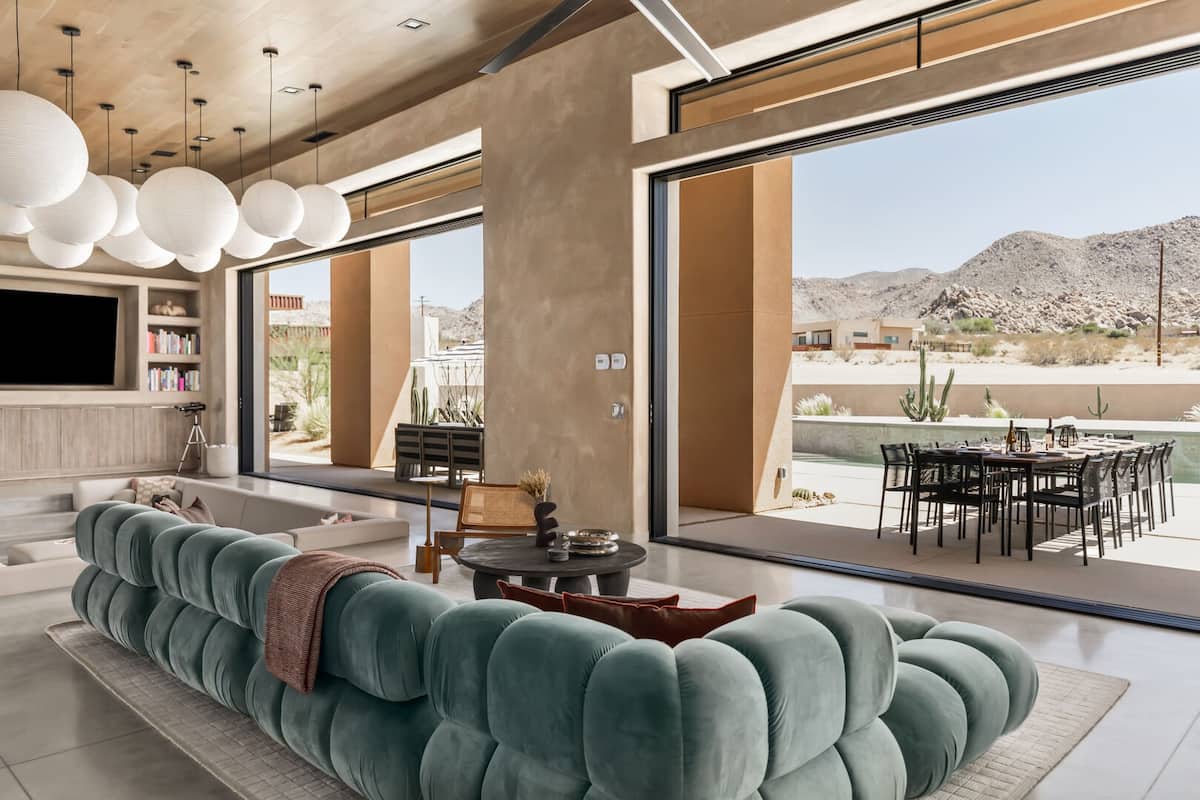 Floor to ceiling windows and sliding glass doors throughout