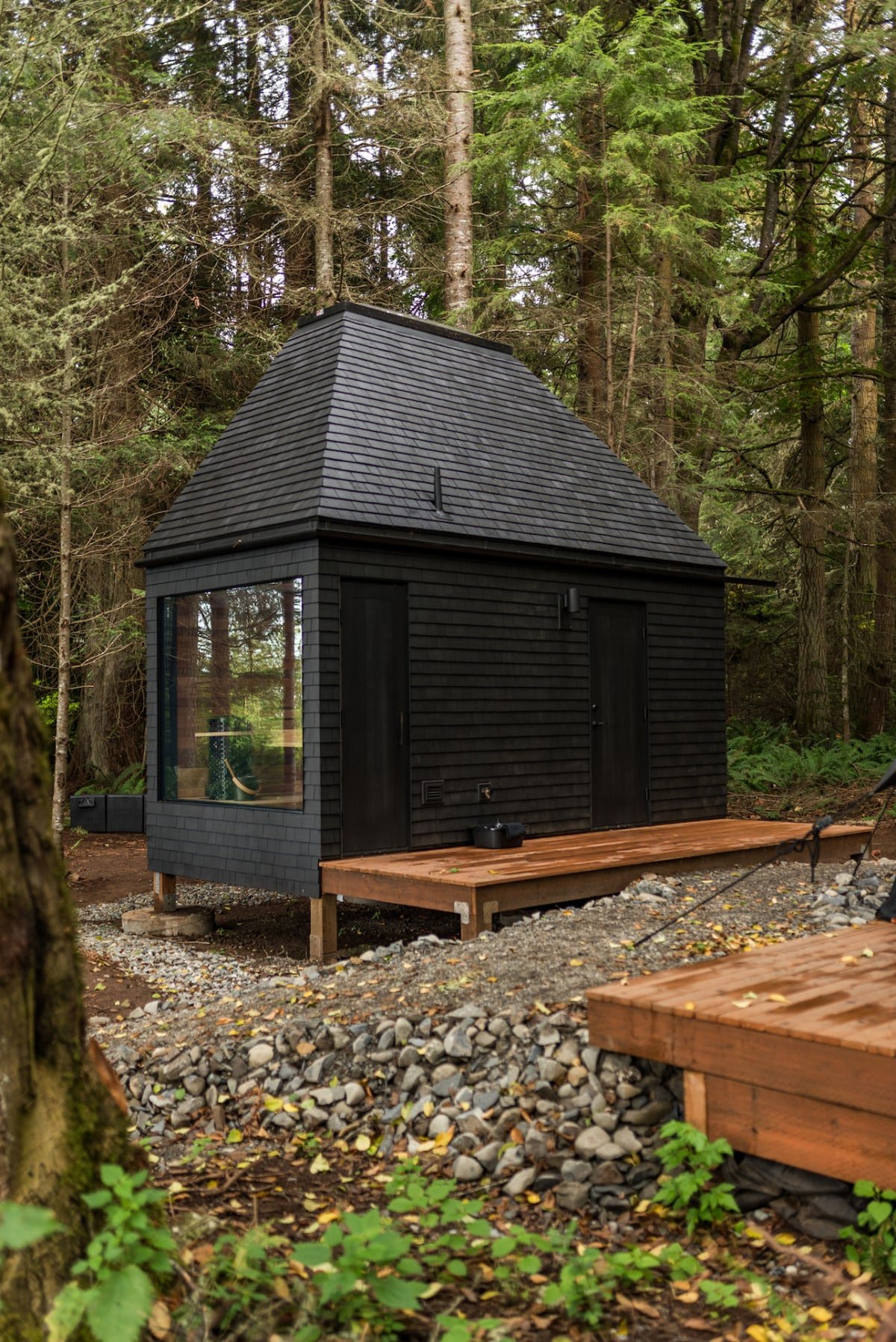 Private, design-forward luxury: your cedar bathhouse offers a spa-like experience without leaving the forest.
