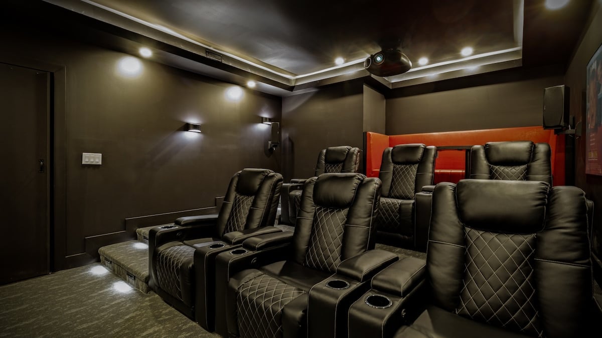 6 full reclining seats that you'll never want to leave and a bar perfect for enjoying a meal with your favorite movie