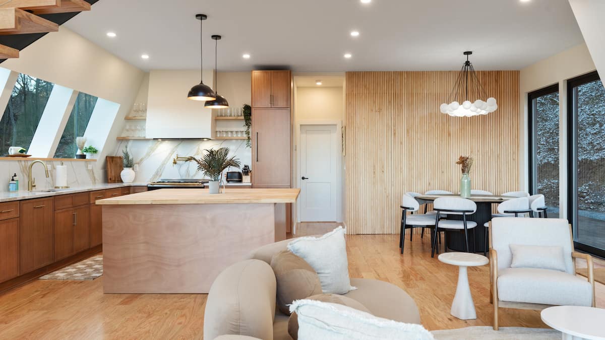 A spacious open floor plan combines the living room, kitchen, and dining; perfect for big or small groups!