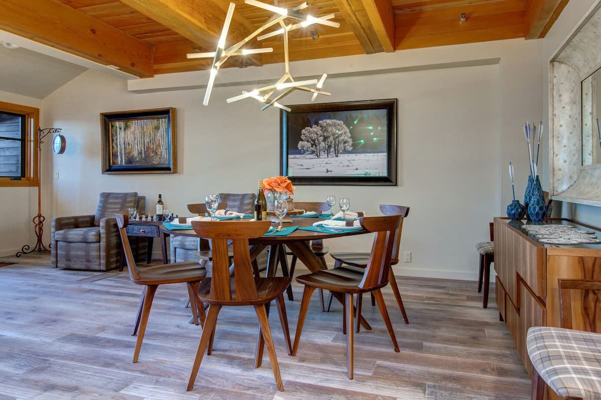 Abode at Stag Lodge | Main Level includes living area, dining, kitchen, laundry, and private balcony with gas grill & hot tub overlooking Deer Valley & Park City