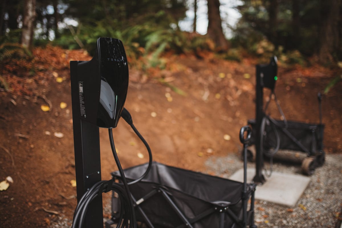 Each parking space is equipped with a Level 2 universal EV charger..