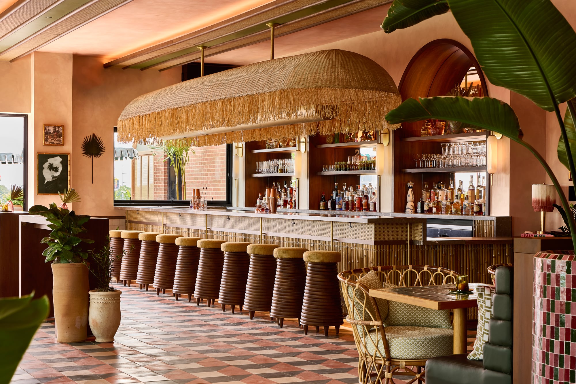 Modern bistro interior with geometric pendant lights and warm ambiance