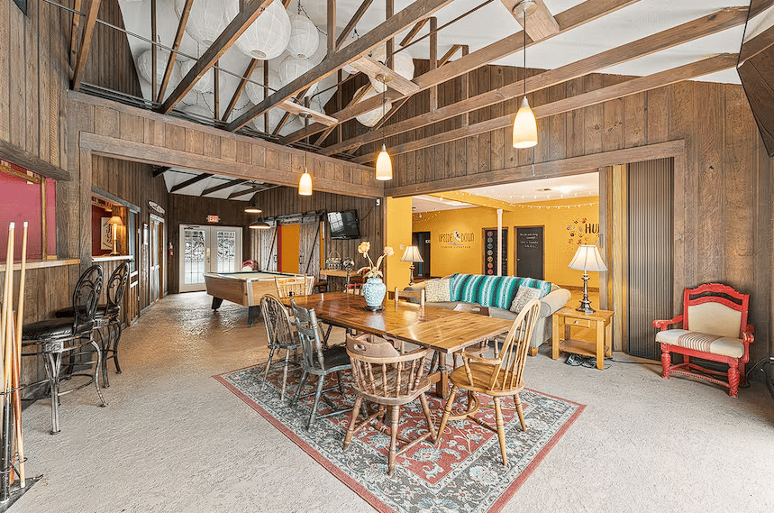 Modern bistro interior with geometric pendant lights and warm ambiance
