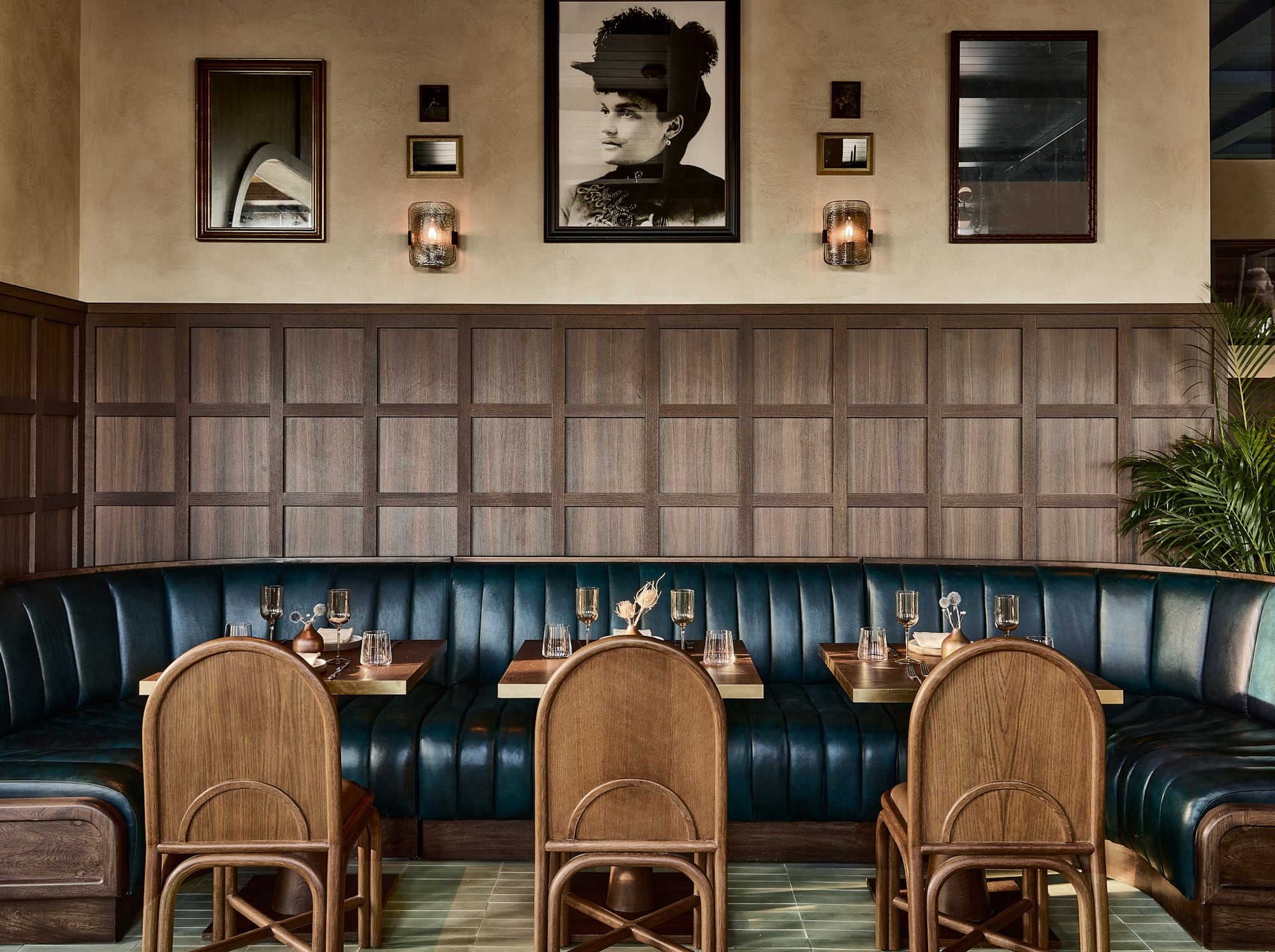 Modern bistro interior with geometric pendant lights and warm ambiance